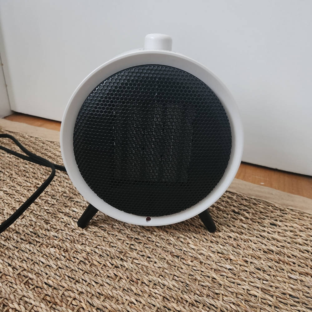 Round White and Black Portable Heater